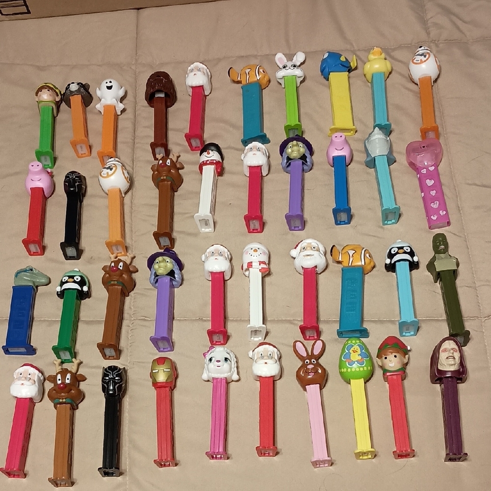 PEZ Dispensers. 75 in all.